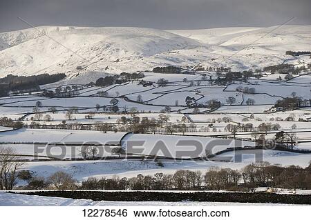 Farmland and mountains covered in snow, near Shap; Cumbria, England View Large Photo Image Stock Photograph - Farmland and mountains covered in snow, near Shap; Cumbria, England. Fotosearch