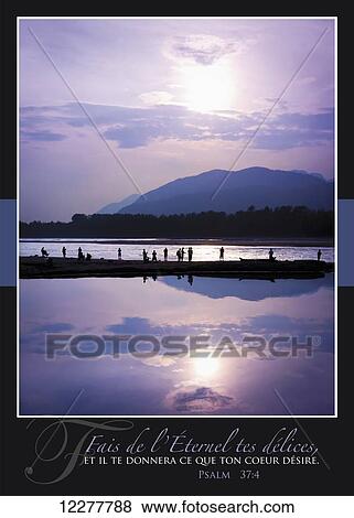 Fishermen standing in a row reflected in the Fraser River at sunset with French scripture; British Columbia, Canada View Large Photo Image Stock Photo - Fishermen standing in a row reflected in the Fraser River at sunset with French scripture; British Columbia, Canada. Fotosearch