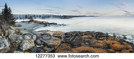 Fog over Lake Superior with ice on the rocks; Thunder Bay, Ontario, Canada View Large Photo Image Stock Image - Fog over Lake Superior with ice on the rocks; Thunder Bay, Ontario, Canada. Fotosearch