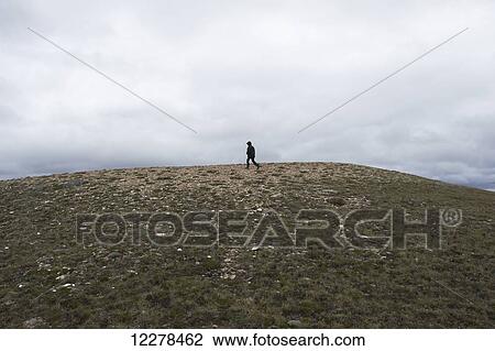 Hiking up Mount Pelly, Ovayok Territorial Park, near Cambridge Bay; Nunavut, Canada View Large Photo Image Stock Image - Hiking up Mount Pelly, Ovayok Territorial Park, near Cambridge Bay; Nunavut, Canada. Fotosearch