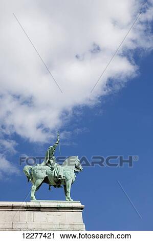 Horse and man statue on Basilica of the Sacred Heart of Paris; Paris, France View Large Photo Image Stock Image - Horse and man statue on Basilica of the Sacred Heart of Paris; Paris, France. Fotosearch