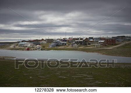 Houses along the river; Cambridge Bay, Nunavut, Canada View Large Photo Image Stock Photo - Houses along the river; Cambridge Bay, Nunavut, Canada. Fotosearch