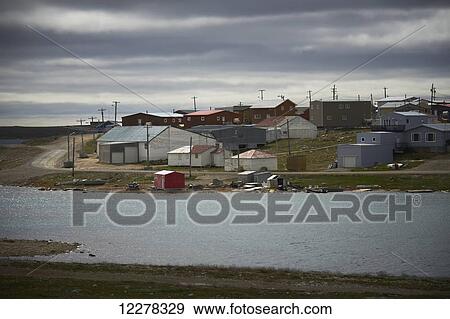 Houses along the river; Cambridge Bay, Nunavut, Canada View Large Photo Image Stock Photo - Houses along the river; Cambridge Bay, Nunavut, Canada. Fotosearch