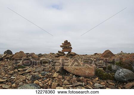 Inukshuk, Western Arm, near Cambridge Bay; Nunavut, Canada View Large Photo Image Stock Image - Inukshuk, Western Arm, near Cambridge Bay; Nunavut, Canada. Fotosearch