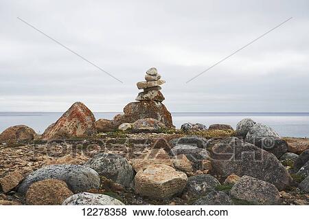 Inukshuk, Western Arm, near Cambridge Bay; Nunavut, Canada View Large Photo Image Stock Photo - Inukshuk, Western Arm, near Cambridge Bay; Nunavut, Canada. Fotosearch