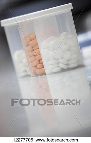 Medication in clear plastic bottles; Edmonton, Alberta, Canada View Large Photo Image Stock Photograph - Medication in clear plastic bottles; Edmonton, Alberta, Canada. Fotosearch