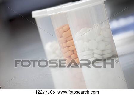Stock Photography - Medication in clear plastic bottles; Edmonton, Alberta, Canada. Fotosearch