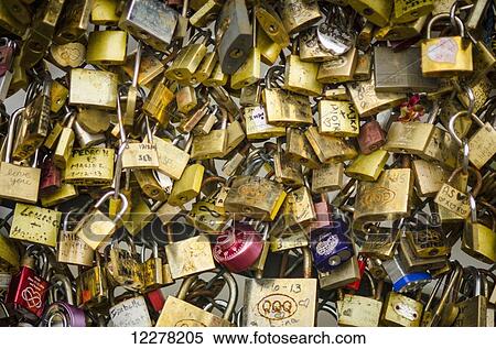 Padlocks with love messages line a bridge; Paris, France View Large Photo Image Stock Photography - Padlocks with love messages line a bridge; Paris, France. Fotosearch
