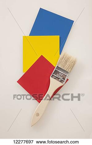 Stock Photo - Paint brush with colour swatches; Edmonton, Alberta, Canada. Fotosearch