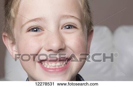 Stock Image - Portrait of a young boy; Spruce Grove, Alberta, Canada. Fotosearch