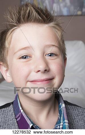 Portrait of a young boy; Spruce Grove, Alberta, Canada View Large Photo Image Stock Image - Portrait of a young boy; Spruce Grove, Alberta, Canada. Fotosearch