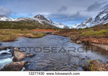 Powerline Pass Valley and the foot bridge leading to Hidden Lake Trail in Chugach State Park on a summer day in Southcentral Alaska View Large Photo Image Stock Image - Powerline Pass Valley and the foot bridge leading to Hidden Lake Trail in Chugach State Park on a summer day in Southcentral Alaska. Fotosearch