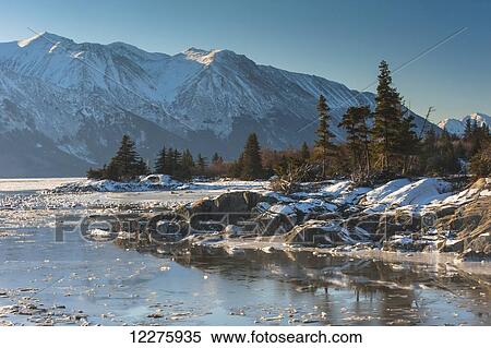 Scenic view in winter of Cook Inlet along Turnagain Arm, Southcentral Alaska View Large Photo Image Stock Photography - Scenic view in winter of Cook Inlet along Turnagain Arm, Southcentral Alaska. Fotosearch
