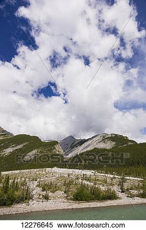 Stock Photography - Scenic view of mountains in the area of Toad River, Muncho Lake Provincial Park, British Columbia, Canada, Summer. Fotosearch