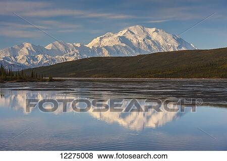 Stock Photo - Scenic view of Mt. McKinley reflecting in Wonder Lake at sunrise, Denali National Park, Interior Alaska. Fotosearch