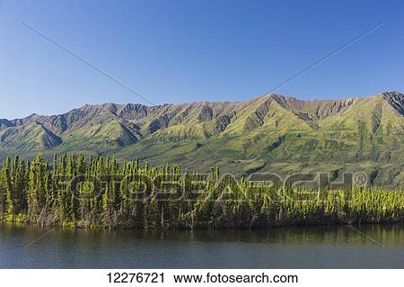 Scenic view of Pickhandle lake and mountains along the Alaska Highway, Yukon Territory, Canada, Summer View Large Photo Image Stock Image - Scenic view of Pickhandle lake and mountains along the Alaska Highway, Yukon Territory, Canada, Summer. Fotosearch