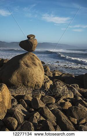 Stones have been balanced on Neahkahnie Beach; Manzanita, Oregon, United States of America View Large Photo Image Picture - Stones have been balanced on Neahkahnie Beach; Manzanita, Oregon, United States of America. Fotosearch