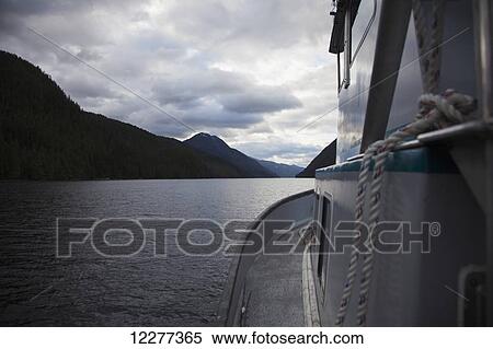Sunset view of Grenville Channel on a cloudy evening, Inside Passage, British Columbia, Canada View Large Photo Image Stock Photography - Sunset view of Grenville Channel on a cloudy evening, Inside Passage, British Columbia, Canada. Fotosearch