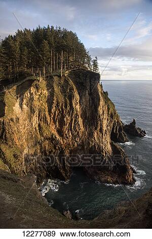 Stock Photo - Tall cliffs are found at Oswald West State Park; Manzanita, Oregon, United States of America. Fotosearch