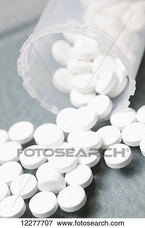 White pills in clear plastic bottles; Edmonton, Alberta, Canada View Large Photo Image Stock Photo - White pills in clear plastic bottles; Edmonton, Alberta, Canada. Fotosearch