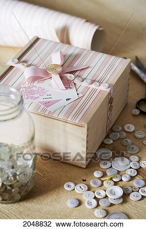 Stock Image - A Crafted Gift Box Decorated With Buttons. Fotosearch