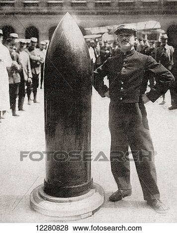 Stock Photo - A German siege-howitzer projectile which fell without exploding at Verdun, France during World War One. From The Illustrated War News, published1915.. Fotosearch