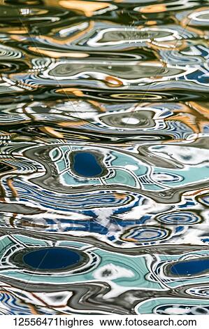 Stock Photograph - A popular restaurant is reflected on the Columbia River; Astoria, Oregon, United States of America. Fotosearch
