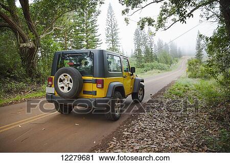 A yellow four-wheel drive Jeep; Lanai, Hawaii, United States of America View Large Photo Image Stock Image - A yellow four-wheel drive Jeep; Lanai, Hawaii, United States of America. Fotosearch