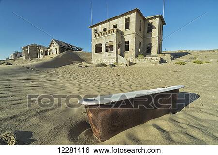Abandoned homes with an old bathtub lying in the sand; Kolmanskop, Namibia View Large Photo Image Stock Photograph - Abandoned homes with an old bathtub lying in the sand; Kolmanskop, Namibia. Fotosearch