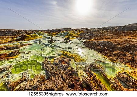Acidic pools, mineral formations, salt deposits in the crater of Dallol Volcano, Danakil Depression; Afar Region, Ethiopia View Large Photo Image Stock Photograph - Acidic pools, mineral formations, salt deposits in the crater of Dallol Volcano, Danakil Depression; Afar Region, Ethiopia. Fotosearch