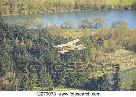 Aerial view of PR 1937 Cabin Waco BiPlane, near Mount Vernon; Washington, United States of America View Large Photo Image Stock Image - Aerial view of PR 1937 Cabin Waco BiPlane, near Mount Vernon; Washington, United States of America. Fotosearch