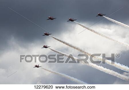 Stock Image - Airplanes flying in formation for an air show; Sunderland, Tyne and Wear, England. Fotosearch