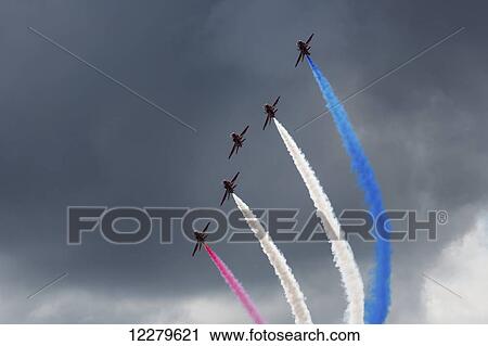Stock Image - Airplanes flying in formation for an air show; Sunderland, Tyne and Wear, England. Fotosearch