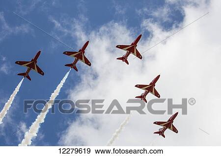Stock Photo - Airplanes flying in formation for an air show; Sunderland, Tyne and Wear, England. Fotosearch