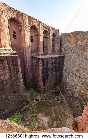 Stock Photograph - Biete Gabriel Ruphael (House of the angels Gabriel and Raphael) Ethiopian Orthodox rock-cut church in the Southern Group of the Rock-Hewn Churches; Lalibela, Amhara Region, Ethiopia. Fotosearch
