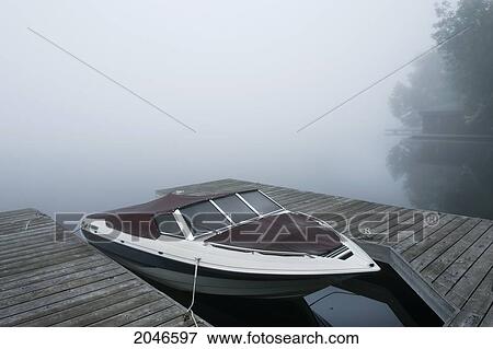 Boat At Dock On Misty Morning, Dudley Bay, Lake Muskoka, Ontario View Large Photo Image Stock Photo - Boat At Dock On Misty Morning, Dudley Bay, Lake Muskoka, Ontario. Fotosearch