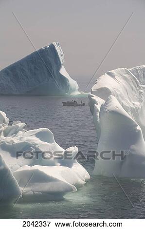 Boat Passing Iceberg In Fog, Quirpon Island, Newfoundland & Labrador View Large Photo Image Stock Photo - Boat Passing Iceberg In Fog, Quirpon Island, Newfoundland & Labrador. Fotosearch