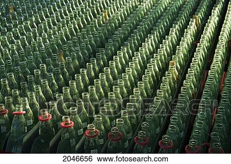 Stock Photograph - Bottles Arrayed For Ring-Toss Game At Midway, Canadian National Exhibition, Toronto, Ontario. Fotosearch