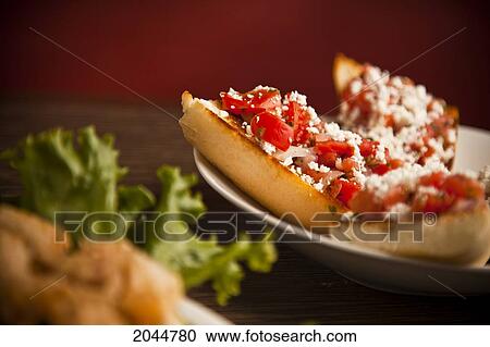 Bruschetta Bread, White Plate, Red Background, Foreground Out Of Focus View Large Photo Image Stock Image - Bruschetta Bread, White Plate, Red Background, Foreground Out Of Focus. Fotosearch
