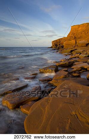 Stock Image - Cavendish Cliffs, Prince Edward Island National Park, Prince Edward Island. Fotosearch