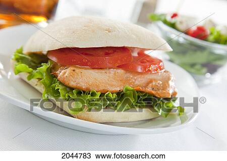 Chicken Sandwich On White Plate, Selective Focus On Salad And Drink On Table Top View Large Photo Image Stock Image - Chicken Sandwich On White Plate, Selective Focus On Salad And Drink On Table Top. Fotosearch
