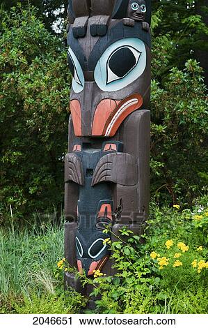 Stock Image - Chief Skedans Mortuary Pole, Stanley Park, Vancouver, British Columbia. Fotosearch