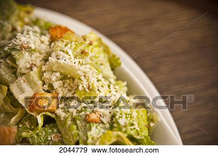 Close Up Of Caesar Salad On Brown Background, Selective Focus View Large Photo Image Stock Photo - Close Up Of Caesar Salad On Brown Background, Selective Focus. Fotosearch
