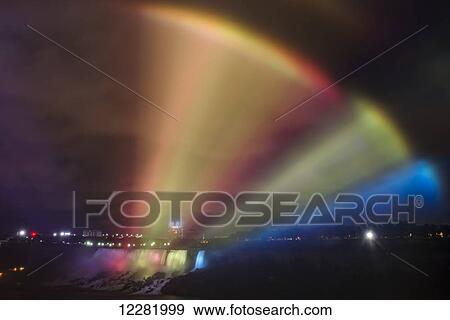 Colorful rays of light from illuminated Horseshoe Falls; Niagara Falls, Ontario, Canada View Large Photo Image Stock Photo - Colorful rays of light from illuminated Horseshoe Falls; Niagara Falls, Ontario, Canada. Fotosearch