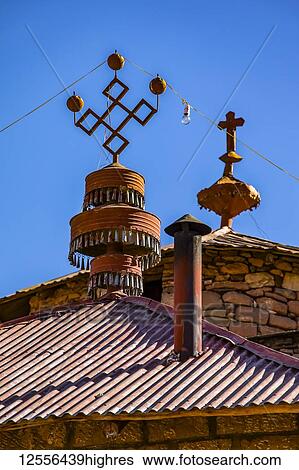 Stock Photograph - Crosses atop Abreha we Atsbeha rock-hewn church; Tigray region, Ethiopia. Fotosearch