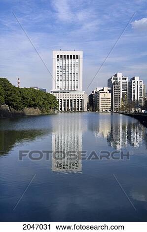 Stock Image - Dai-Ichi Seimei Building And Palace Moat, Hibya, Tokyo, Japan. Fotosearch