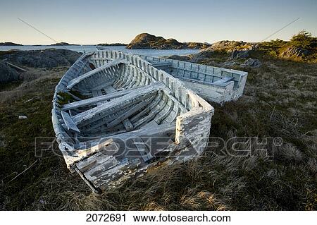 Stock Image - Derelict Boats, Change Islands, Newfoundland & Labrador. Fotosearch