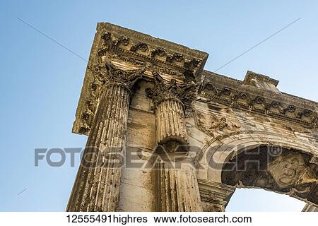 Stock Photograph - Detail of the Arch of the Sergians, an Ancient Roman triumphal arch; Pula, Istria, Croatia. Fotosearch