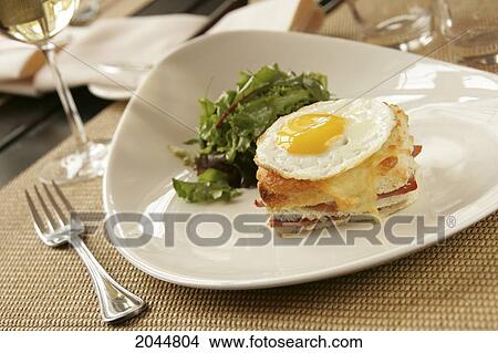 Picture - Egg Breakfast Dish On Table Setting With Wine. Fotosearch