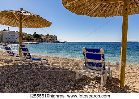 Stock Photograph - Famous beautiful Mala Raduca beach; Primosten, Croatia. Fotosearch